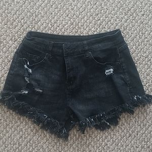 Never worn cute torn black denim shorts